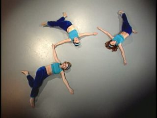 Bellydancers demonstrating static back stretch Bellydancers demonstrating static back stretch