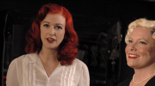 Burlesque dancer Bettina May showing vintage makeup instruction