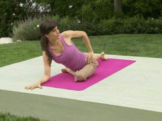 Elena Brower does pigeon pose