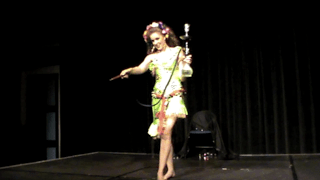 Galit Mersand performing shisha dance, bellydance, with melaya leff costume
