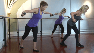 Zayna Gold demonstrates arm exercises with weights